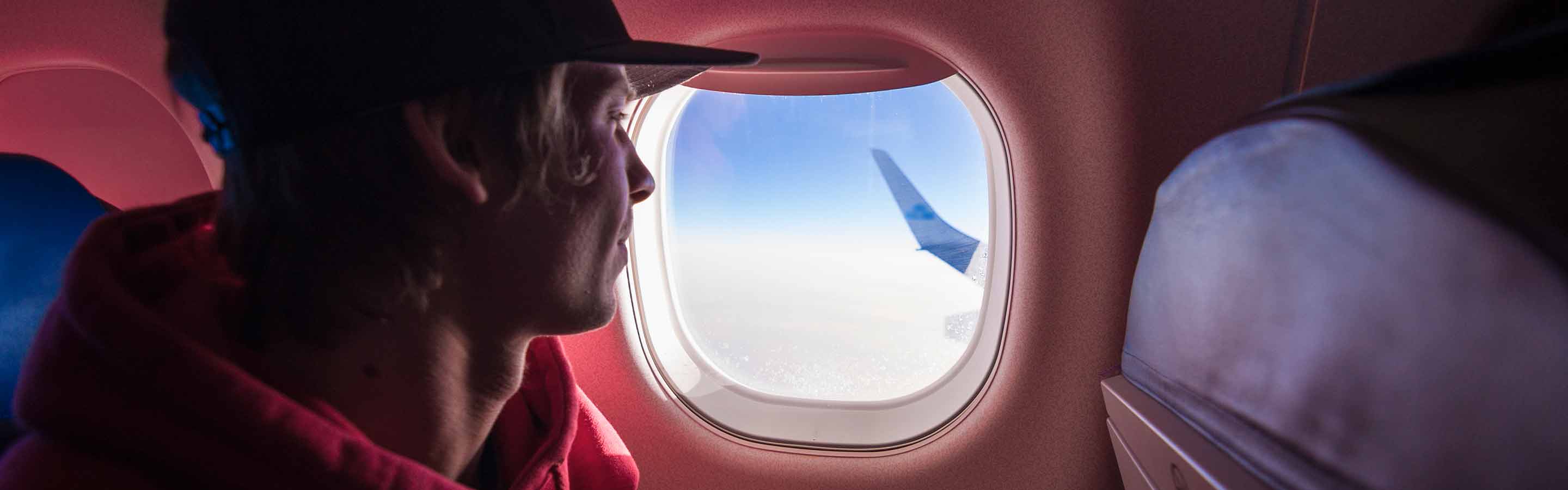 Passagier an Bord eines Flugzeugs nach Neuseeland.