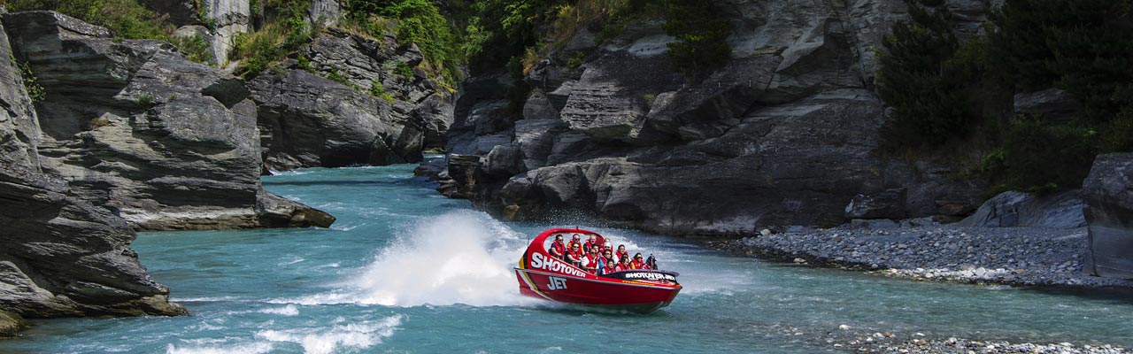 The Shotover rises up the river that winds through a canyon.